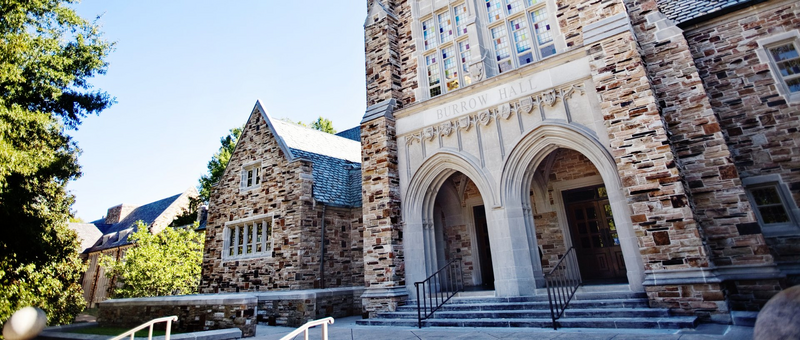  a large sandstone building in the Collegiate Gothic style